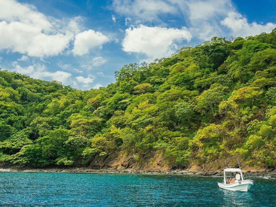 Private boat in a secluded Costa Rica rainforest bay